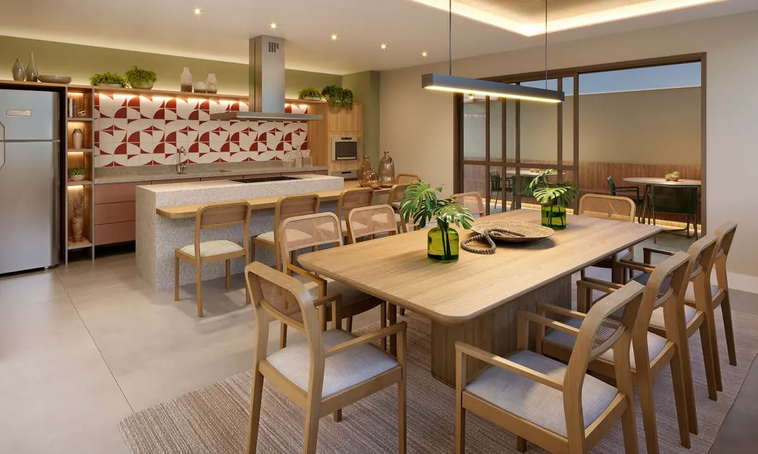 Salão de festas gourmet do Dom Park Residencial com cozinha, ilha e mesa de jantar